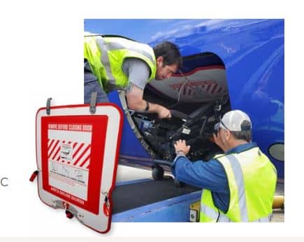 Two Workers Installing Aircraft Cargo Door Shield Image